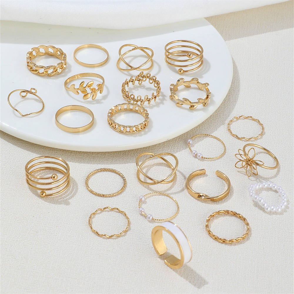 Close-up of stainless steel, gold plated, and silver plated ring finishes